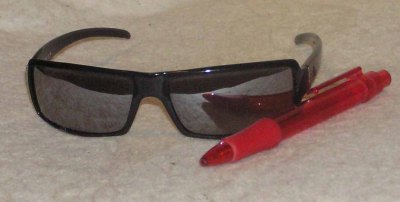 Sunglasses and pen